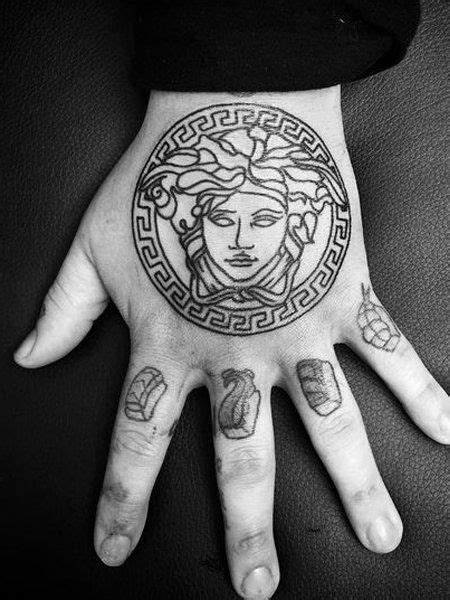 tatuaggio medusa versace|THE VERSACE LOGO EXPLAINED (What Does the Medusa .